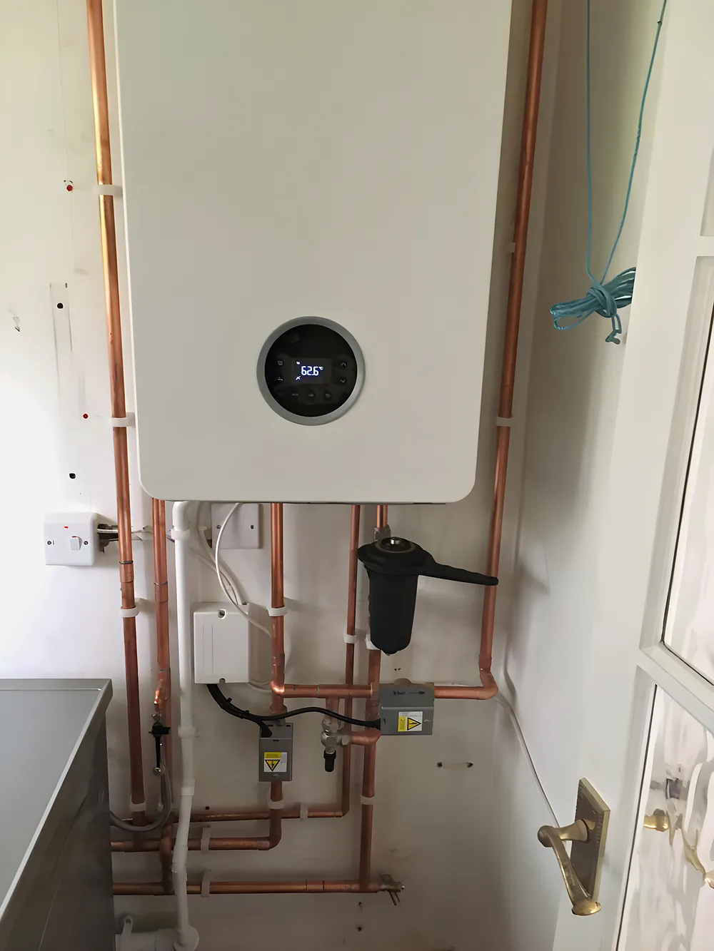 A new boiler with neat copper pipework and a magnetic filter