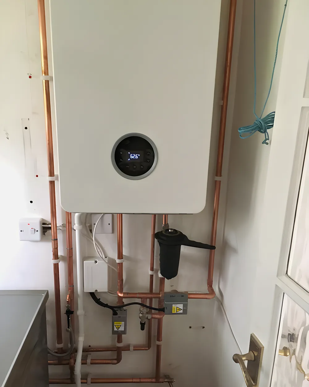 A new boiler with neat copper pipework and a magnetic filter